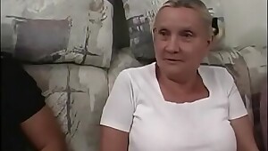 Busty grandma looks slightly ridiculous in her tight top and short mini skirt, but there is no doubt that she is damn good in bed